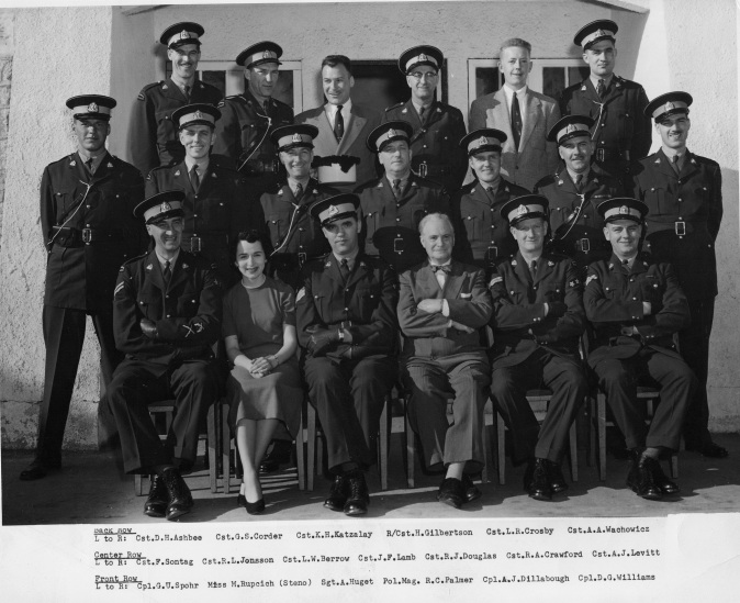 Group photograph of RCMP Richmond Detachment personnel, including Police Magistrate R.C. Palmer, in the 1950s. City of Richmond Archives Photograph 2010 37 1